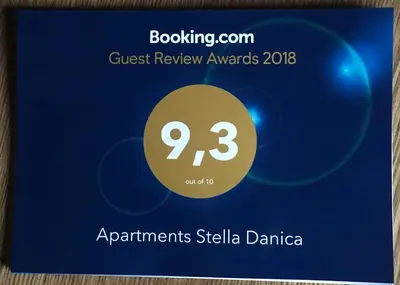 a sign for the guest review awards at apartments stella danica at Apartment Stella Danica in Čatež ob Savi