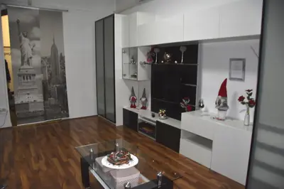a living room with christmas items on display at CityApartment-Maribor in Maribor