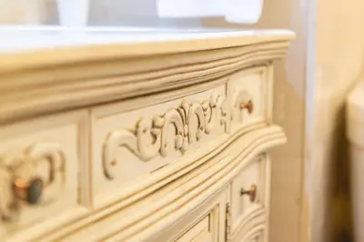 a close up of a wooden cabinet in a room at Casino & Hotel ADMIRAL Skofije in Zgornje Škofije