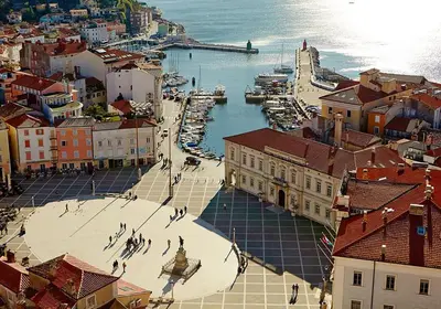 an aerial view of a city with a harbor at PR`Cajhn in Radovljica