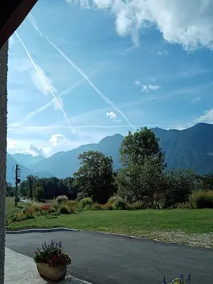 a view of a road with mountains in the background at Apartment Vida in Bovec