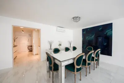 a dining room with a table and chairs at AB Ljubljana - The Princess Castle Triplex in Ljubljana