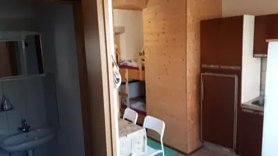 a bathroom with a sink and a toilet in a room at Apartma NADIŽA in Borjana