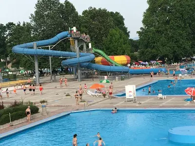 a group of people in a pool at a water park at Lucky home in Čatež ob Savi