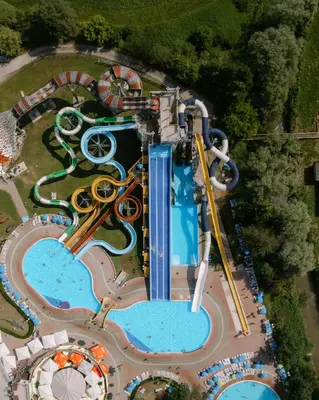 an overhead view of a water park with a roller coaster at Terme Olimia - Aparthotel Rosa in Podčetrtek