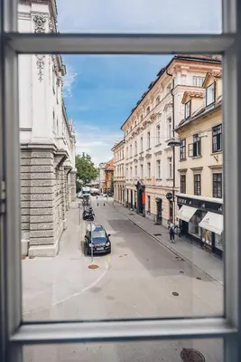 a view of a city street from a window at Feel Ljubljana Centre in Ljubljana