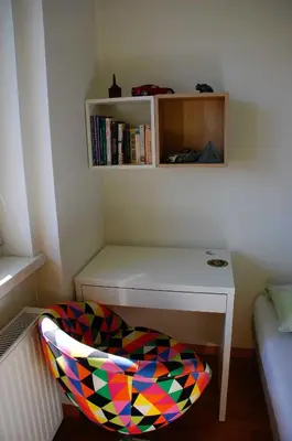 a small room with a desk and a chair at Apartments Peter & Free parking in Ljubljana