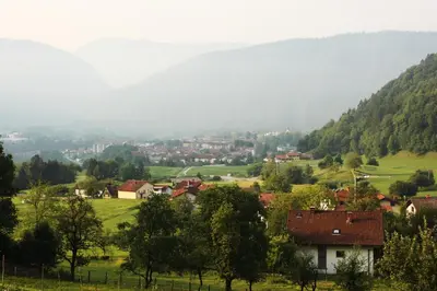 a small village in a valley with a mountain at Apartmaji 43 in Tolmin