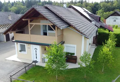 a small house with a metal roof at Apartma Marija in Metlika