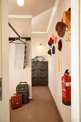 a hallway with a room with a fire hydrant at Karavla Private Villa in Šentilj
