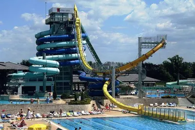 a water slide at a water park with a pool at Apartment Maja Moravske Toplice in Moravske Toplice
