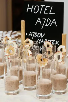 a group of glasses filled with food on a table at Hotel Ajda Depandance Prekmurska Vas - Terme 3000 - Sava Hotels & Resorts in Moravske Toplice