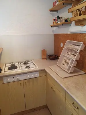 a kitchen with a stove and a stove top oven at Getaway 