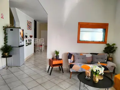 a living room with a couch and a table at Apartments & rooms Saša in Podčetrtek