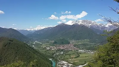 a view of a valley with snow capped mountains at Apartma Jezero in Most na Soči