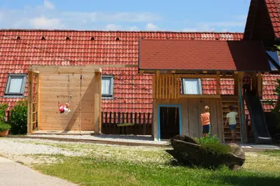 a house being constructed with a red roof at Farm Stay Zevnik in Brežice