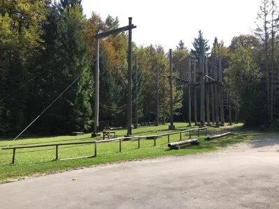 a park with a playground with a roller coaster at Apartma NEVA in Bohinj