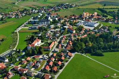an aerial view of a small town with houses and trees at Hotel Prebold in Prebold
