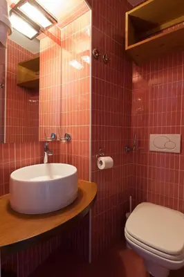 a bathroom with a sink and a toilet at Julija&Robert's Riverview Apartments and Rooms in Ljubljana