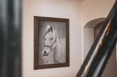 a picture of a horse on a wall at Učni ranč Bohinj, Boutique Horse-Friendly Retreat in Bohinj