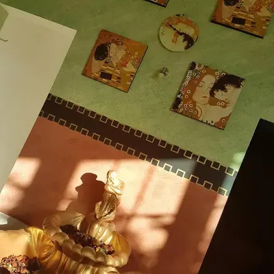 a view of a table with a doll and a clock at Hotel Cateski Dvorec in Čatež ob Savi