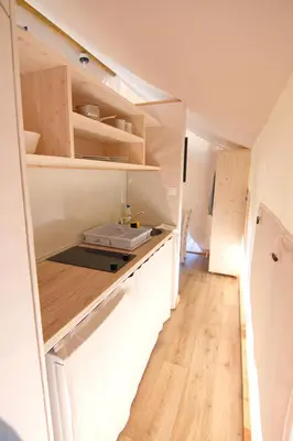 a small kitchen with a counter in a room at Glamping SUN VALLEY Bioterme in Mala Nedelja