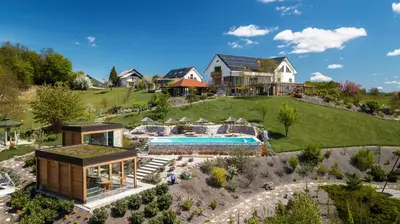 an aerial view of a house with a pool on a hill at B&B Villa Angelina in Rogaška Slatina