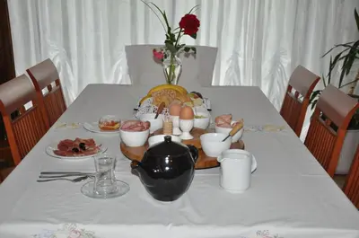 a table with a tray of food on it at Green Point in Preserje