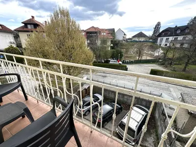 a couple of cars parked on a balcony at Apartment Emona Bled 4 in Bled