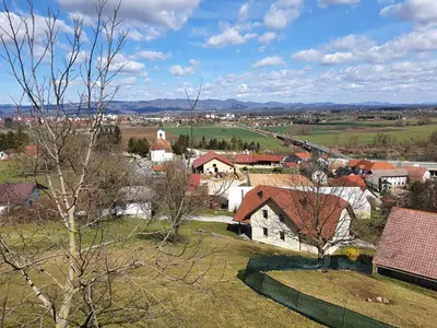an aerial view of a small town with houses and trees at Gnezdo Vid-ik in Čatež ob Savi