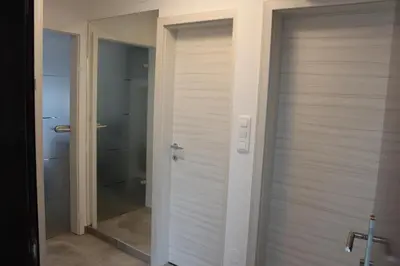 a door leading to a shower in a bathroom at ApBovec in Bovec