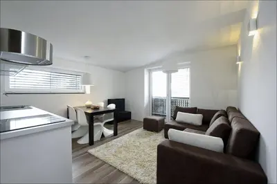 a living room with a couch and a table at House Neza in Kranjska Gora