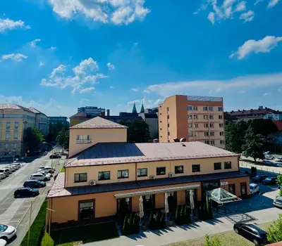 an aerial view of a building in a city at Hotel Piramida in Maribor