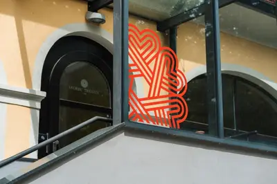 a red heart is in a window of a building at Dvorec Trebnik - SOBE in Slovenske Konjice