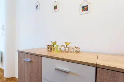 a kitchen with a wooden counter top in a room at Apartma Luna in Kranjska Gora