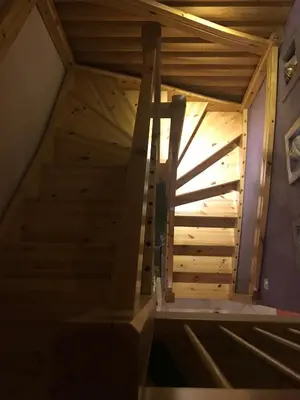 a stairwell in a house under construction at Romantic Cottage House in Žužemberk