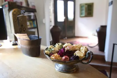 a bowl of food sitting on a table at Hotel Katrca in Ljubljana