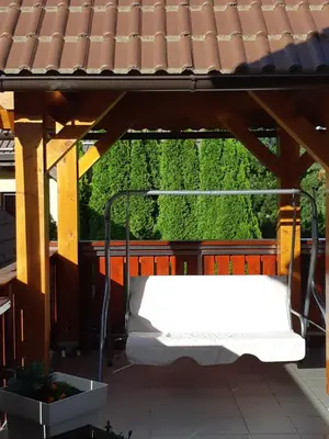 a bed on the roof of a house at Nigritella in Kranjska Gora