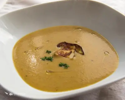 a bowl of soup with a piece of food in it at Ranch Marina in Koče