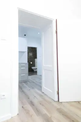 an open door in a room with a bathroom at Apartma City & Free Parking in Ljubljana