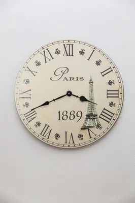 a clock with the eiffel tower on it at Big yard in Ljubljana