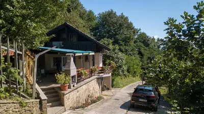 a car parked in front of a house at Apartma PEPI in Rogaška Slatina