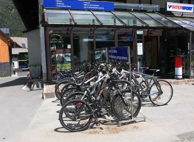 a bunch of bikes parked in front of a store at Apartments and Rooms Bernik in Kranjska Gora