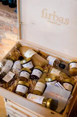 a crate filled with wine bottles in a box at Tourist Farm Firbas in Cerkvenjak