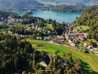 an aerial view of a town with a lake at Tourist house Capricorn in Bled