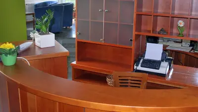an office with a desk with a laptop computer on it at Bed and Breakfast Kogoj in Nova Gorica