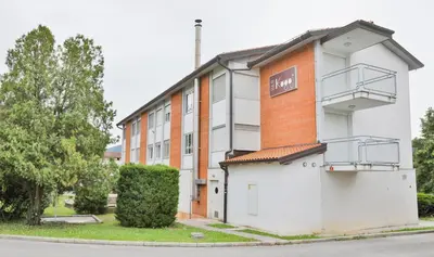 a building with a sign that reads hotel at Bed and Breakfast Kogoj in Nova Gorica