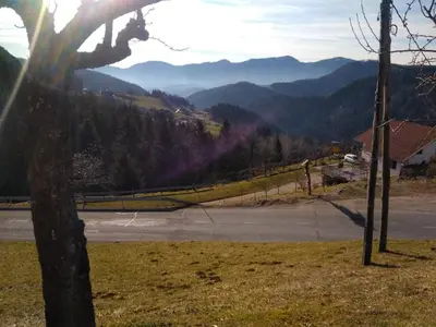 a view of a road with mountains in the background at Apartment Jorsi with Mountain View in Zreče