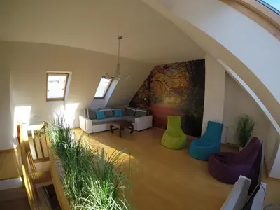 a living room with a couch and chairs at Wild Soca House Apartment No.5 in Bovec