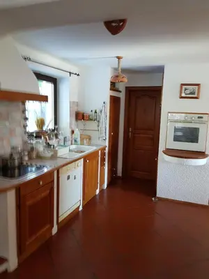 a kitchen with a sink and a microwave at Pr'Simi in Golnik